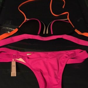 Sexy pink and black and orange bikini